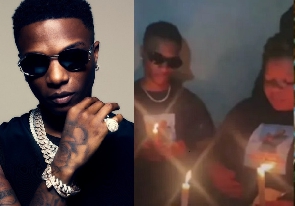 Wizkid and sister at mum's candlelight procession