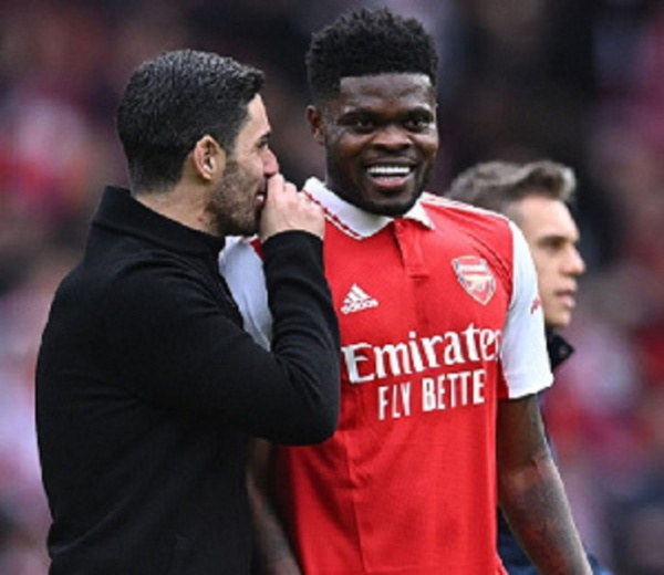 Thomas Partey with manager Mikel Arteta