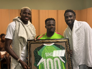 Super Eagles captains Wilfred Ndidi and Victor Osimhen honours Moses Simon on his 100th appearance