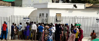 File photo of customers trooping into a bank