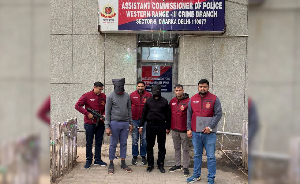 The suspects in blindfolds