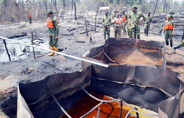 Burnt illegal refining site