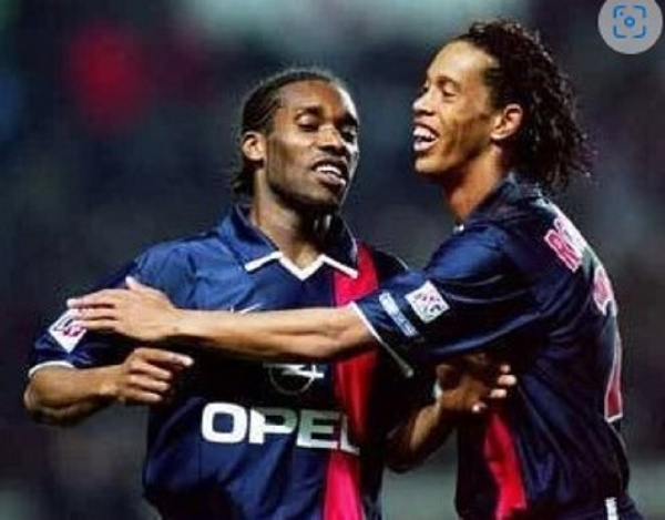 Jay-Jay Okocha and Ronaldinho during their playing days at PSG