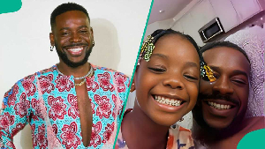 Adekunle Gold and daughter