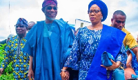 ADC chieftain Rauf Aregbesola and wife