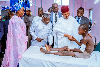 Vice President Kashim Shettima with a victim in Borno