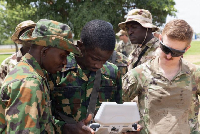 A U.S soldier and Nigerian soldiers in Bauchi