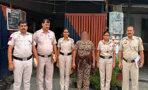 Indian authorities with one of the suspects