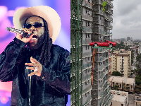 Burna Boy had his Ferrari lifted by crane