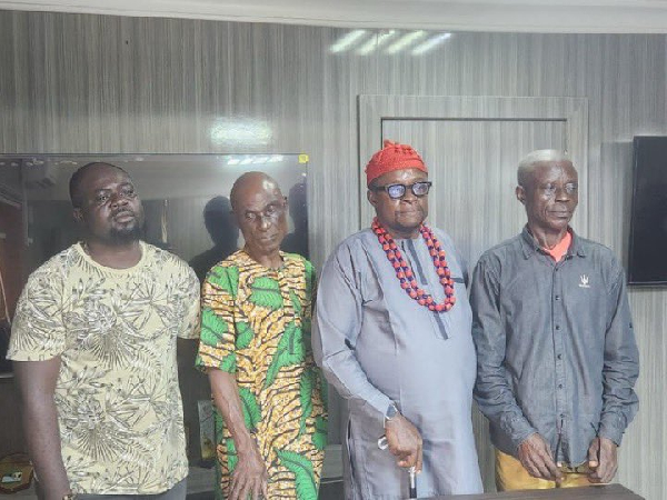 Azubuike on red cap alongside the other arrested individuals