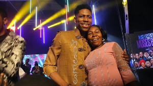 Gospel singer Moses Bliss and his mother