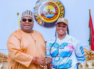 Governor Ademola Adeleke offers a scholarship to Osun puff-puff seller