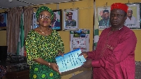 The outgoing Osun NYSC state Coordinator, Olayinka Abdulwahab and the incoming one, Agbor Ndoma Obim