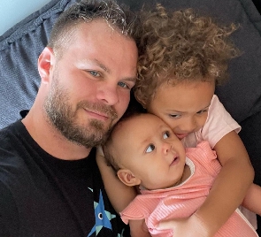 Justin Dean with his daughters