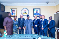 Minister of Finance, Wale Edun (4th left, with executives of First Abu Dhabi Bank)