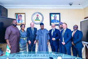 Minister of Finance, Wale Edun (4th left, with executives of First Abu Dhabi Bank)