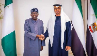 President Bola Ahmed Tinubu in a handshake with UAE President, Mohammed bin Zayed Al Nahyan