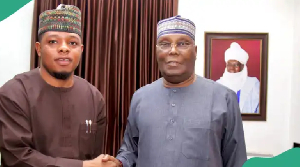 Atiku Abubakar receiving APC chieftain Obidike Chukwuebuka during a visit in Abuja