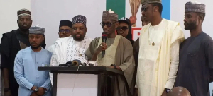 Abba Atiku Abubakar (c) speaks during a visit to the APC National Secretariat in Abuja
