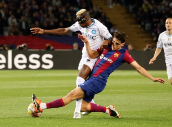 Victor Osimhen up against Pau Cubarsí during Barcelona vs Napoli in 2024
