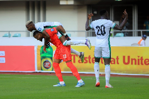 Super Eagles players celebrate a goal