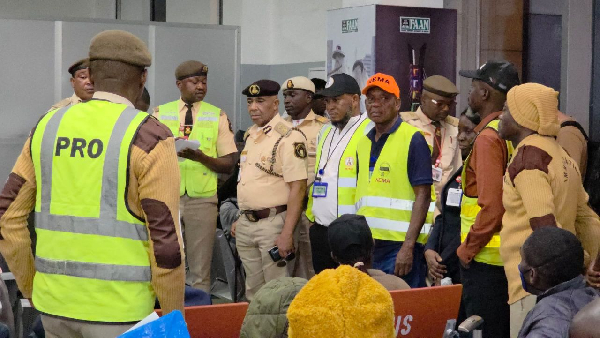 NEMA officials and the returnees