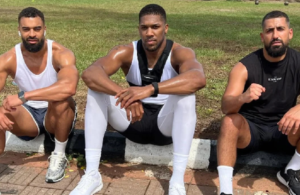 Anthony Joshua with his close friends and team members, Sina Ghami and Latif ‘Latz’ Ayodele