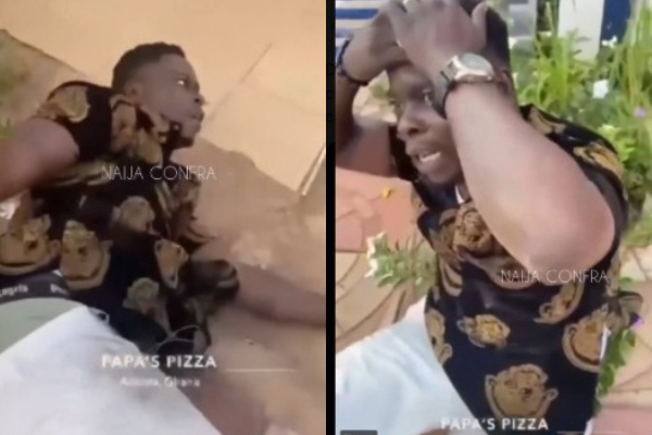 A member of a rival group beaten by some Aye cultist