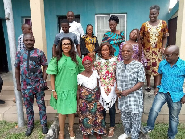 The centenarian Akara seller in a group picture