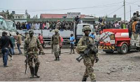M23 rebels escort govt soldiers and police who surrendered to an undisclosed location in Goma