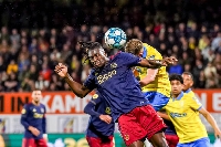 Calvin Bassey in action for Ajax