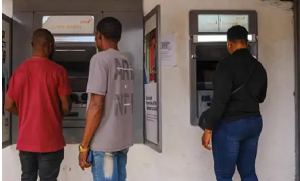 Photo of people using ATM machine