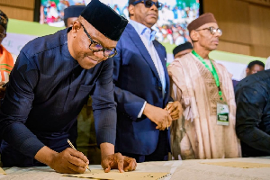 Peter Obi signing National Peace Accord