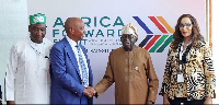 President Tinubu shaking hands with CAF President Motsepe