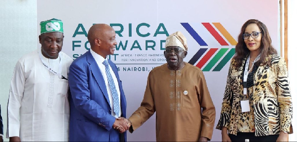 President Tinubu shaking hands with CAF President Motsepe