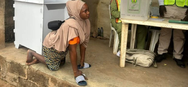 Physically challenged voter, Aminat Akinsola at the polling unit   Photo: Nigerian Tribune