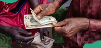 Naira strengthens slightly against the dollar while external reserves move closer to the $55 bills