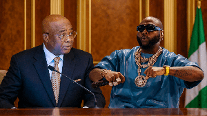 L-R: Governor of Imo State, Hope Uzodimma and Afrobeats star, Davido