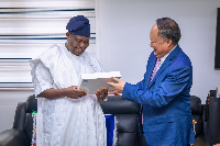 Akume and a Chinese representative