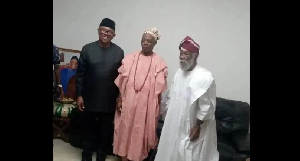 Obi, Oba Ladoja and an unidentified man