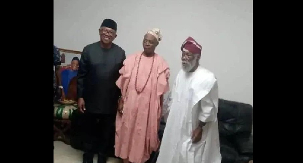 Obi, Oba Ladoja and an unidentified man