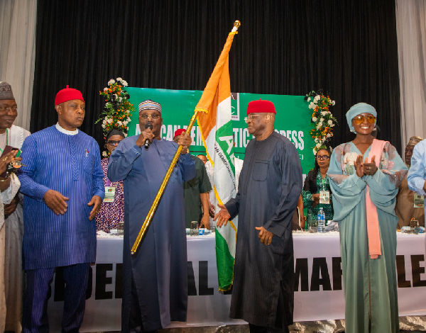 Atiku Abubakar receiving ADC flag