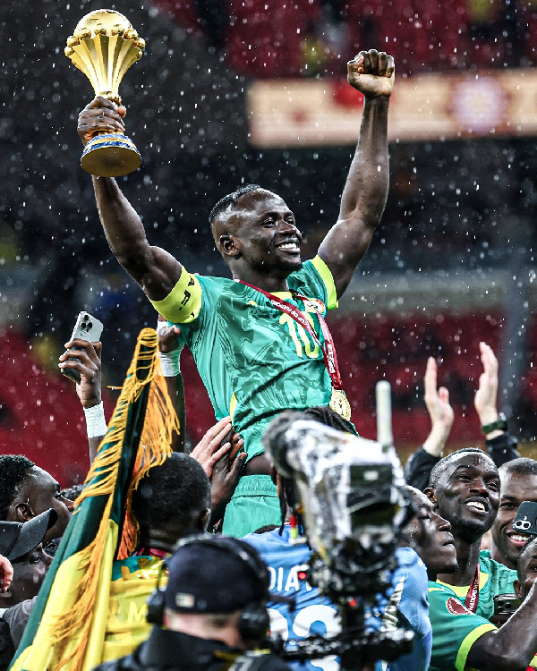 Sadio Mane hoists the AFCON trophy