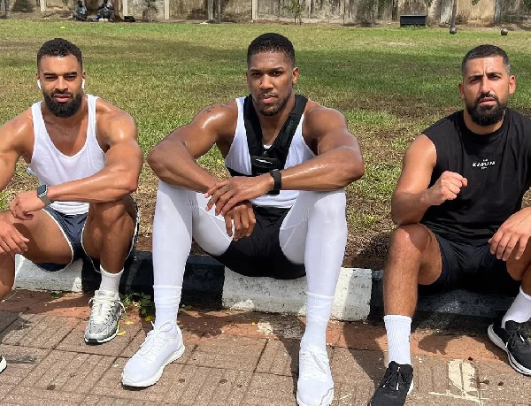 Boxer Anthony Joshua with his late friends, Latif Ayodele and Gami Sina
